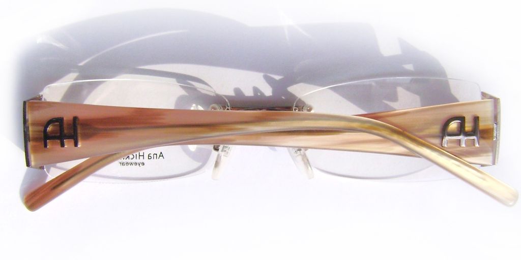 Безободковые очки-невидимки Ana Hickmann AH1093 01A Brown